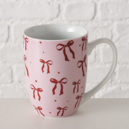 Becher mit Schleifen auf neutralem Hintergrund