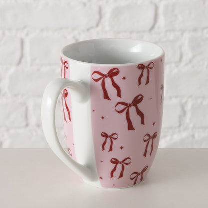 Fröhlicher Becher mit Schleifenmotiv als stylisches Accessoire